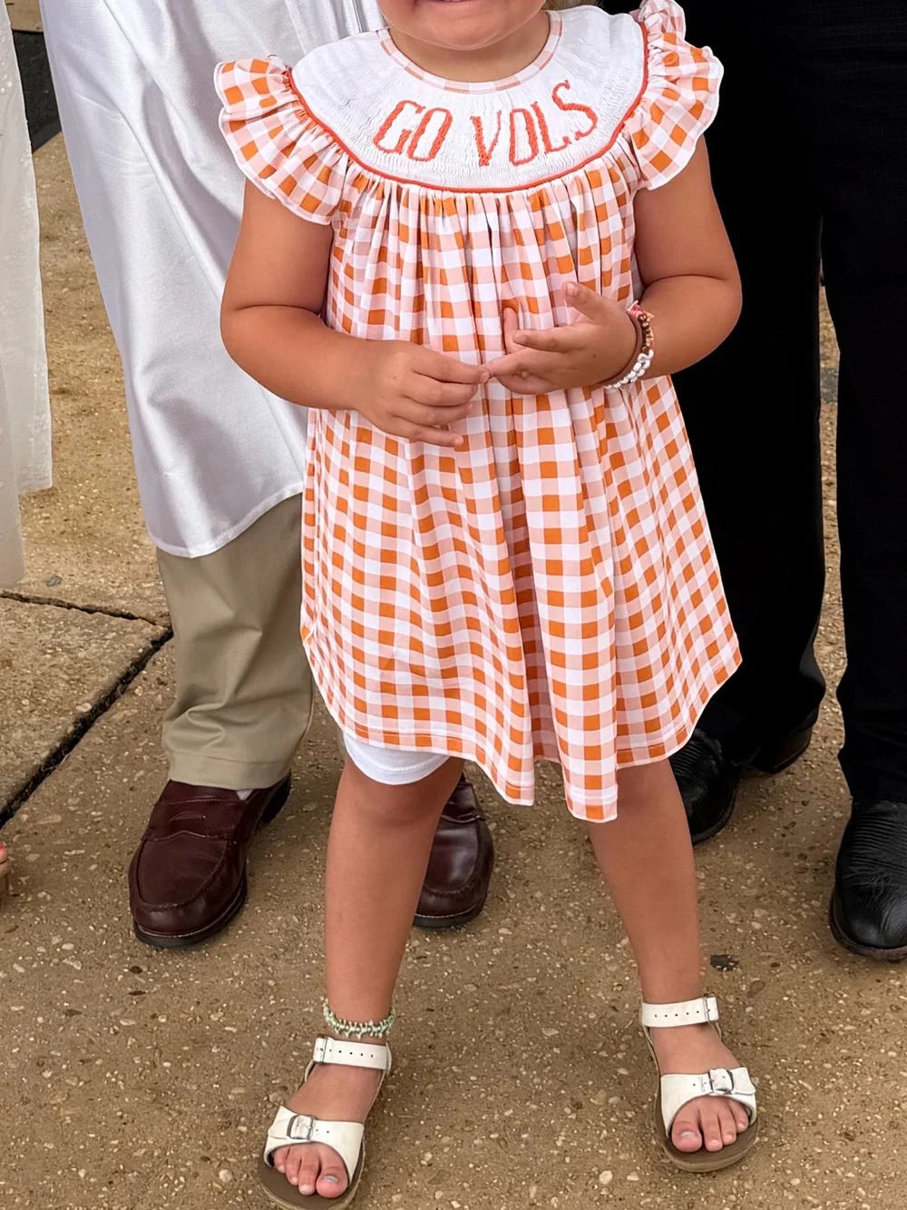 Orange Gingham dress with 'GO VOLS' Smocked.